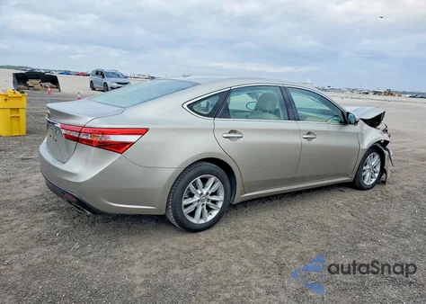 2015 Toyota Avalon Xle z USA, uszkodzony, nr VIN 4T1BK1EB8FU140121